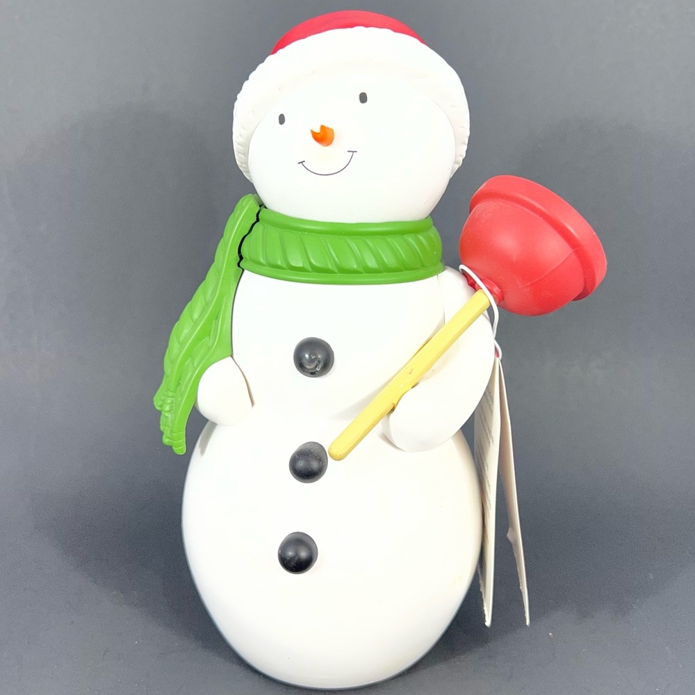 Jolly in the John Snowman Hallmark Motion Activated He talks and sings!